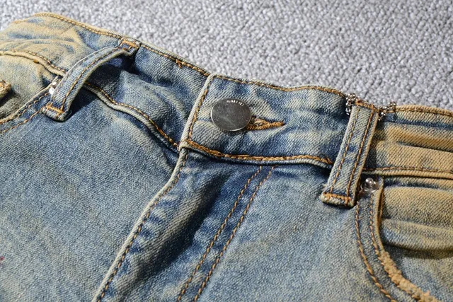 Jean bleu slim-fit distressed avec éclaboussures de peinture 5
