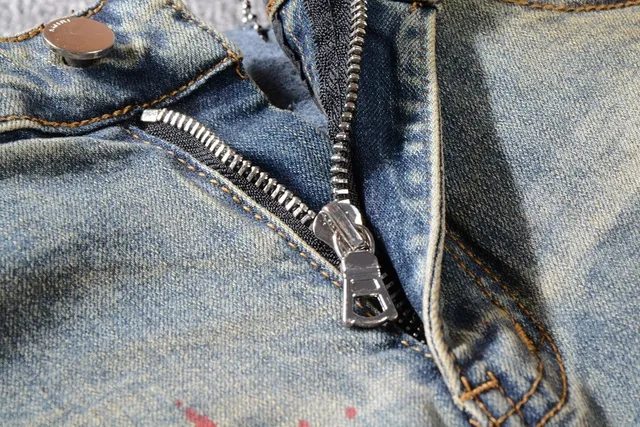 Jean bleu slim-fit distressed avec éclaboussures de peinture 8