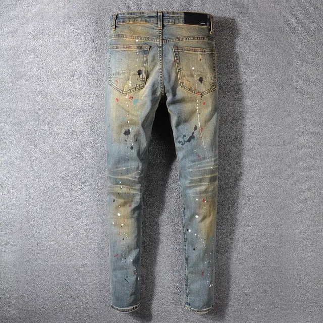 Jean bleu slim-fit distressed avec éclaboussures de peinture 10