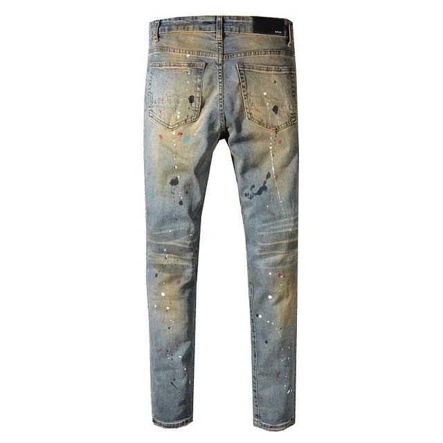 Jean bleu slim-fit distressed avec éclaboussures de peinture 11