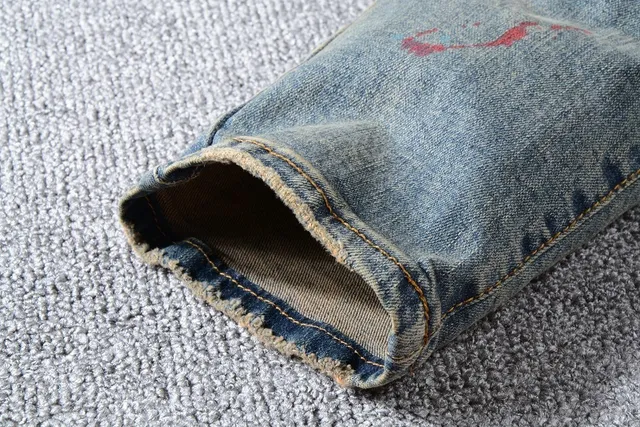 Jean bleu slim-fit distressed avec éclaboussures de peinture 15