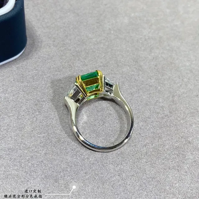 Emerald-Cut Green Gemstone and Trillion Diamond Two-Tone Ring 2
