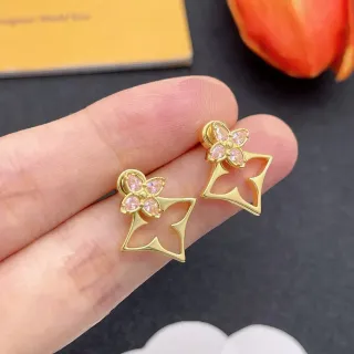 Brincos de metal com motivo de flor de quatro pétalas em dourado e rosa