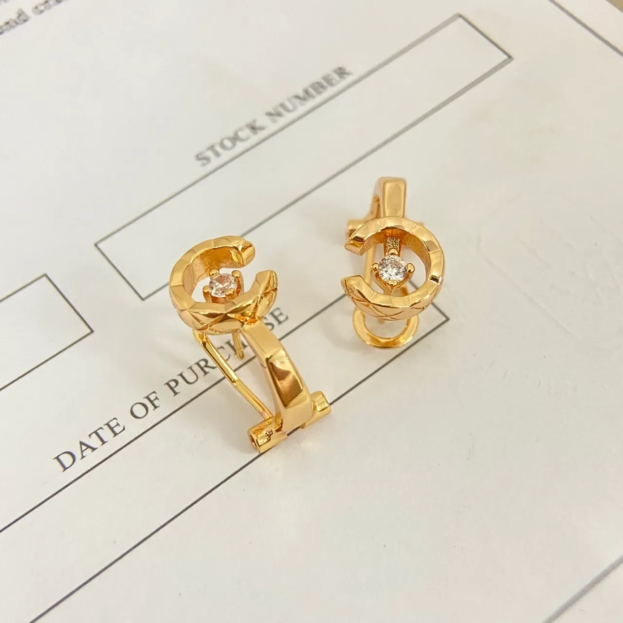Boucles d'oreilles C en forme de C Huggie en or et argent avec centre de pierre facettée 6