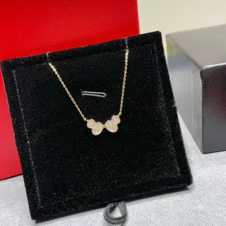 Collier avec pendentif double cœur Pavé en ton doré