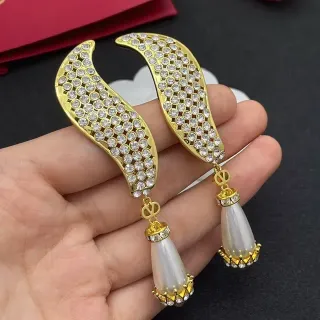 أقراط ذهبية وبيضاء مع كريستال بافيه أجنحة قطرة لؤلؤ
