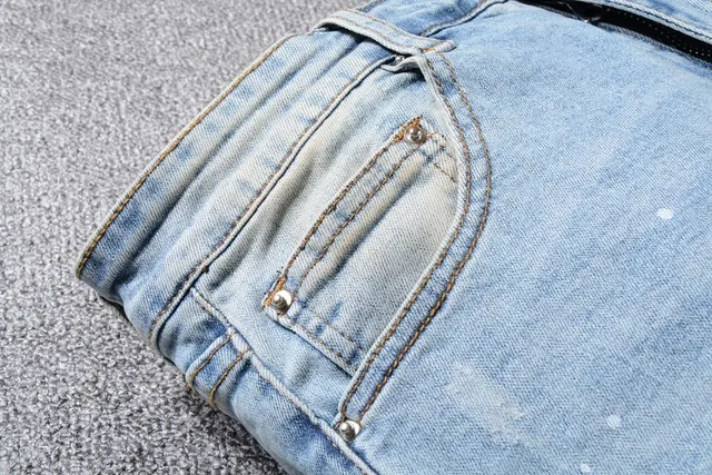Light Wash Blue Distressed Patchwork Paint-Splattered Slim-Fit Jeans 10