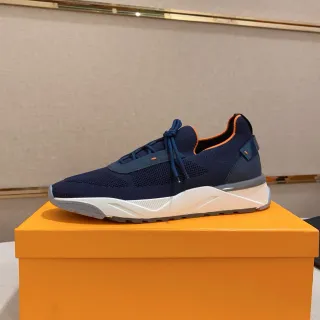 Zapatilla lifestyle de punto azul marino y naranja