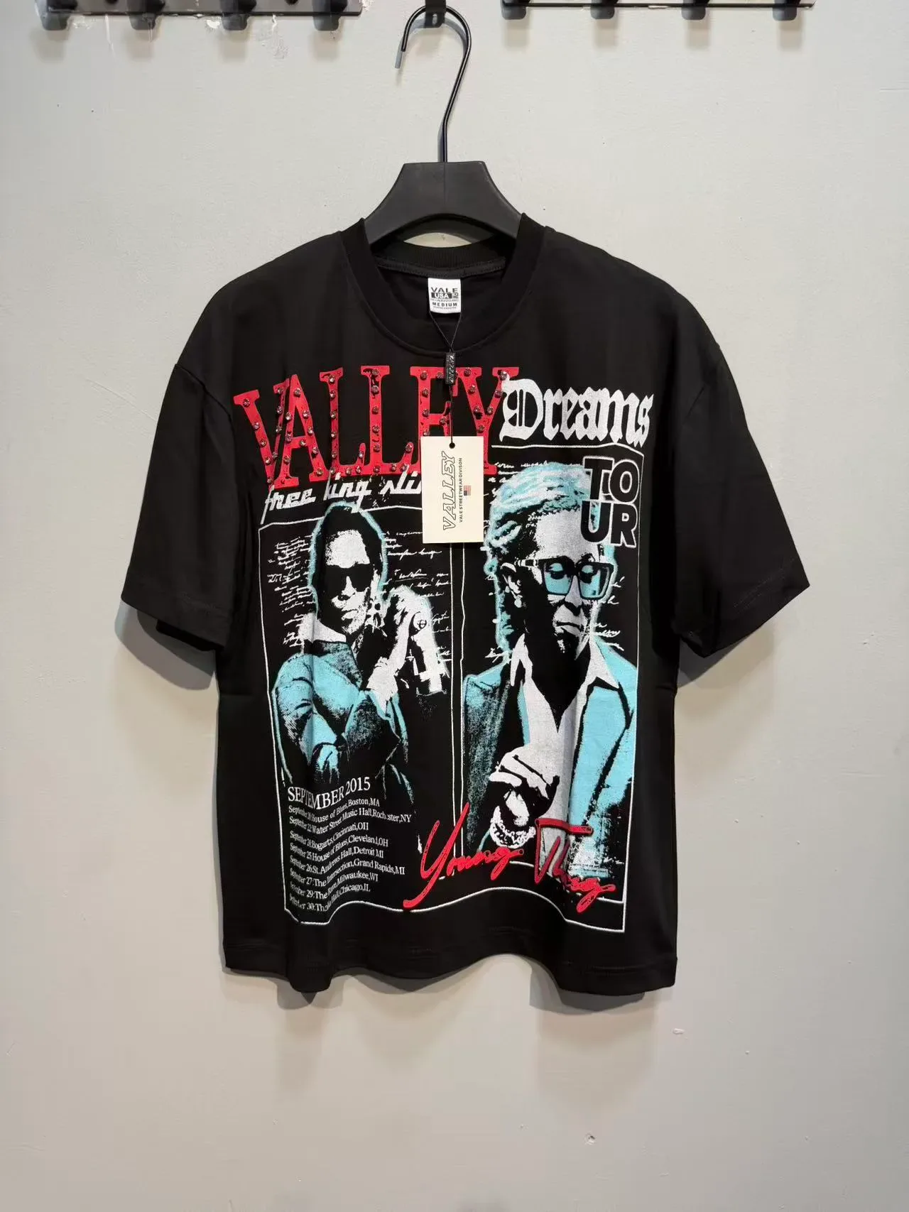 T-shirt olive et noir à affiche graphique de tournée 14
