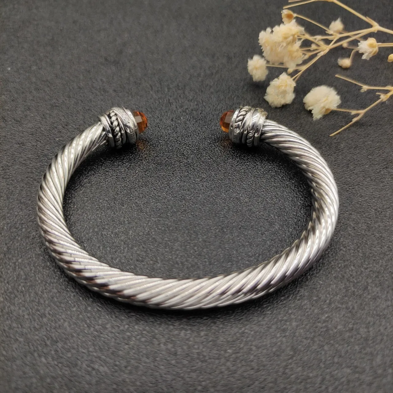 Joaillerie câble torsadé argent marron construction terminal ambre facetté 7