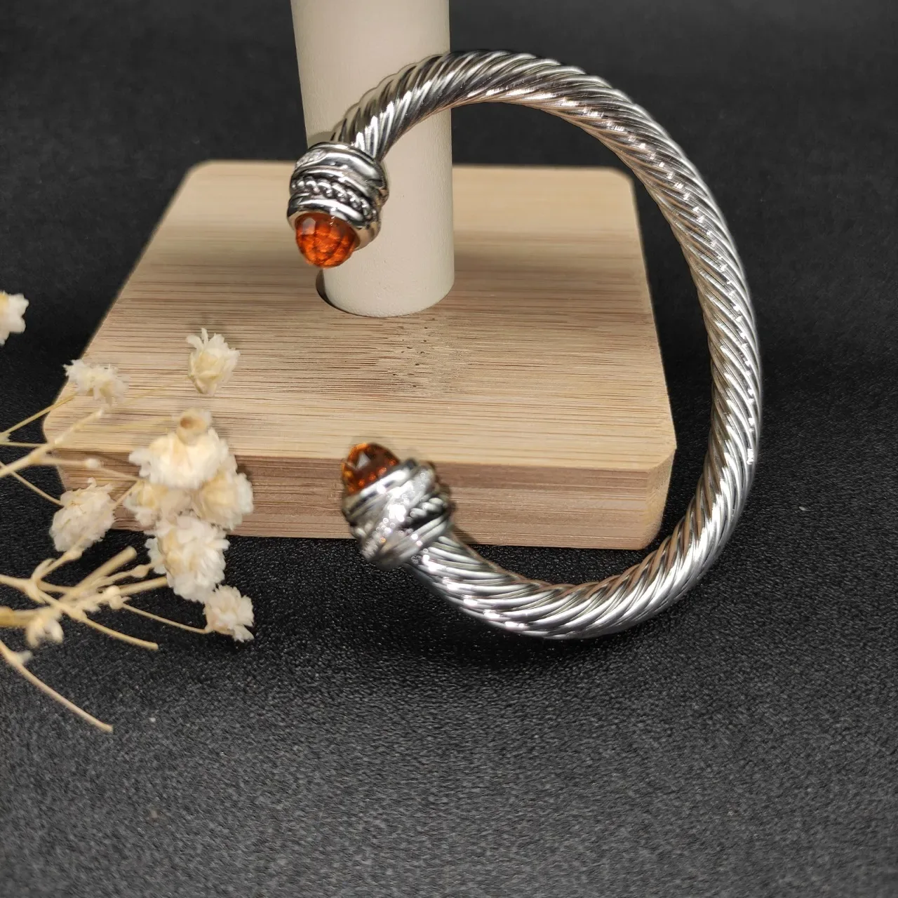 Joaillerie câble torsadé argent marron construction terminal ambre facetté 8