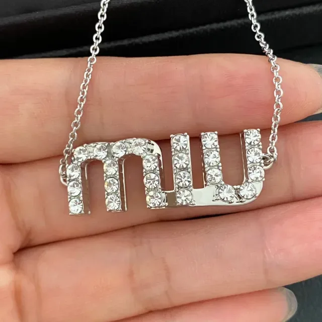 Silver-Tone Pavé Crystal 'MU' Logo Chain Bracelet 6