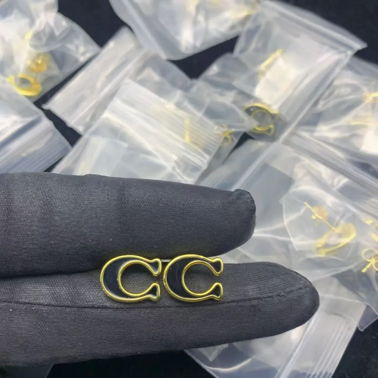White Enamel Gold-Tone C-Shape Logo Stud Earrings 5