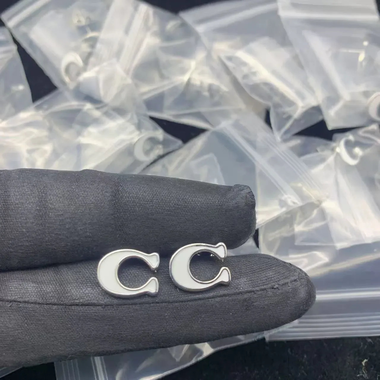 White Enamel Gold-Tone C-Shape Logo Stud Earrings 6