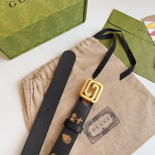 Gucci काली सोने की बनावट वाली इंटरलॉकिंग जी बकल लेदर बेल्ट