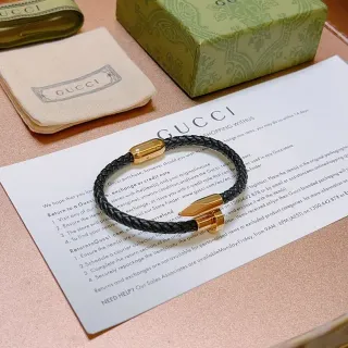 Gucci Pulsera de Cuero Trenzado Negro y Oro