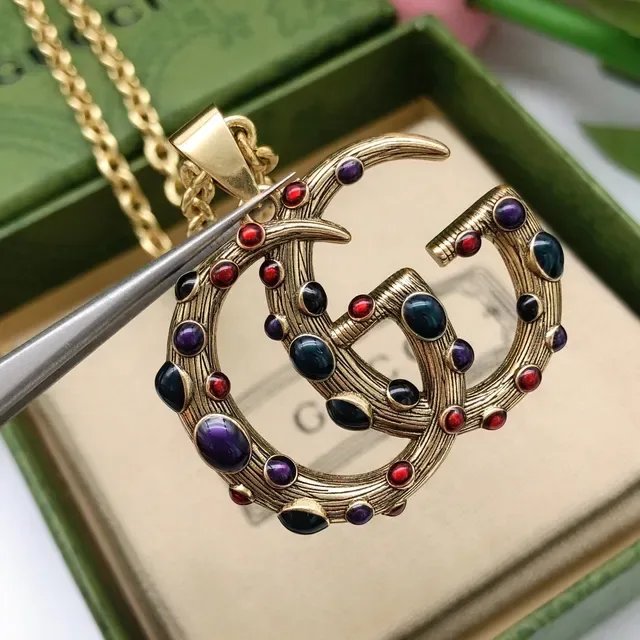Gucci GG Marmont Collier à pendentif multi-pierres Interlocking G 3