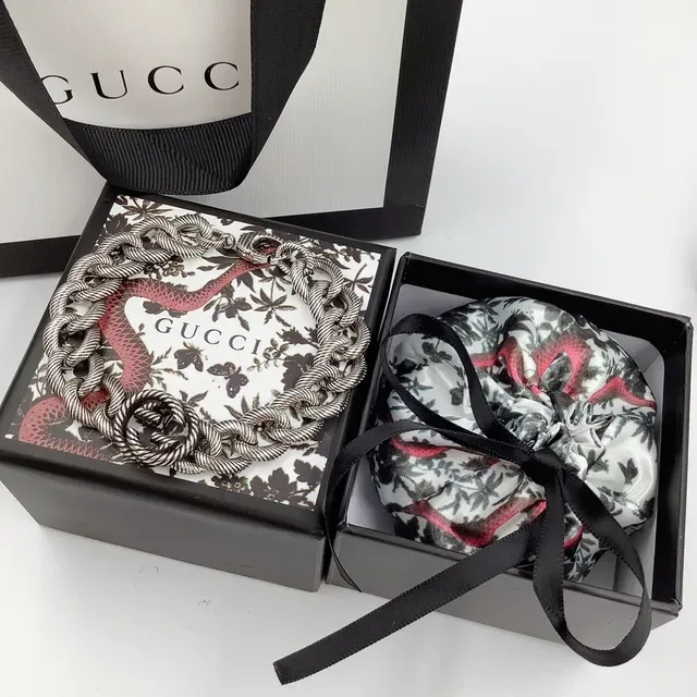 سوارة Gucci GG Marmont رابطة حبل ملتوية فضية 3