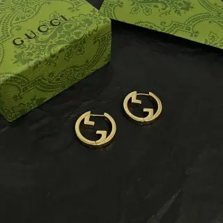 Gucci أقراط ذهبية مع شعار G Interlocking