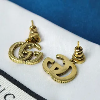 Gucci ذهبي Interlocking G Logo نسيج مخطط أقراط