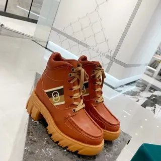 Gucci Rhyton भूरी चमड़े की एंक्ल बूट्स