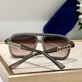 Gucci Screener Translucent Smoky Gray Logo-Temple Sunglasses