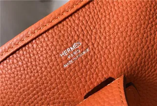 Hermès Evelyne Perforado H Logo Naranja Bolsa bajo el brazo 4