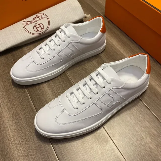 Hermès blanc et orange accent style de vie sneakers 3