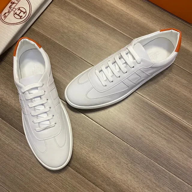 Hermès blanc et orange accent style de vie sneakers 4