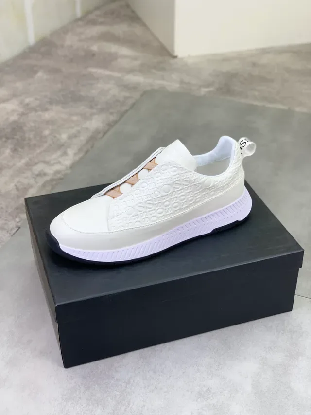 Hugo Boss Chaussure lifestyle slip-on blanche avec monogramme embossé 4