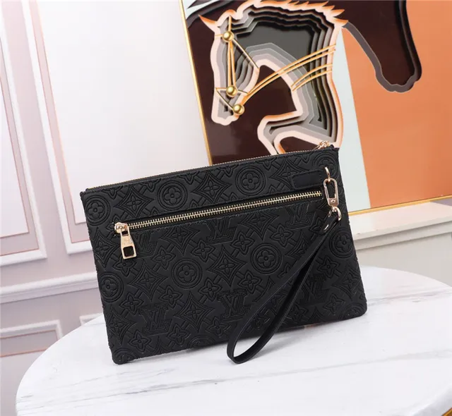 Louis Vuitton Black Gold Embossed Monogram Empreinte Leather LV Turn-Lock Clasp Wristlet 7