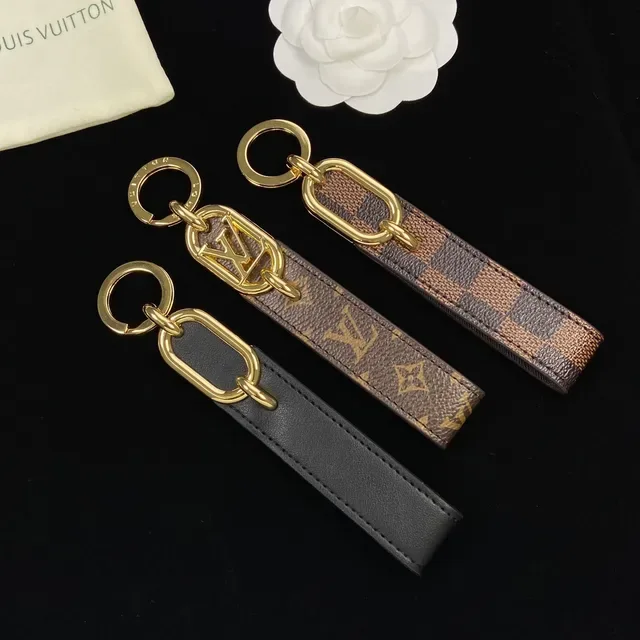 路易威登棕黑金色调椭圆LV徽章缝合皮革肩带手袋 2