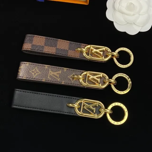 路易威登棕黑金色调椭圆LV徽章缝合皮革肩带手袋 6