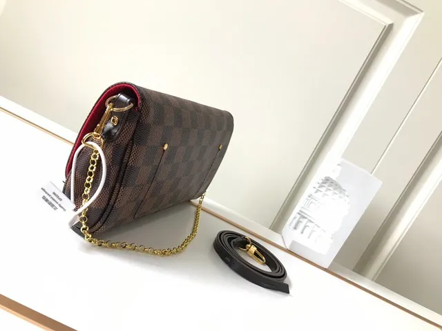 路易威登棕金色Damier Ebène格子帆布硬件手袋 3