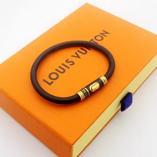 Pulsera Louis Vuitton Circle Negro Dorado Banda de Goma Hebilla Cilíndrica 6