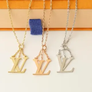 Colar Louis Vuitton com pendentif de monograma em ouro e prata, corrente