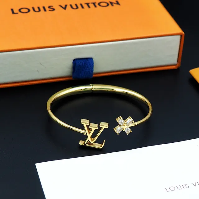 Bracelet Louis Vuitton doré LV monogramme et fleur de cristal ouvert 2