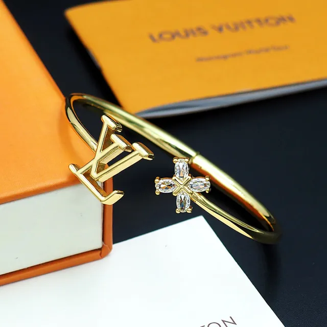 Bracelet Louis Vuitton doré LV monogramme et fleur de cristal ouvert 4