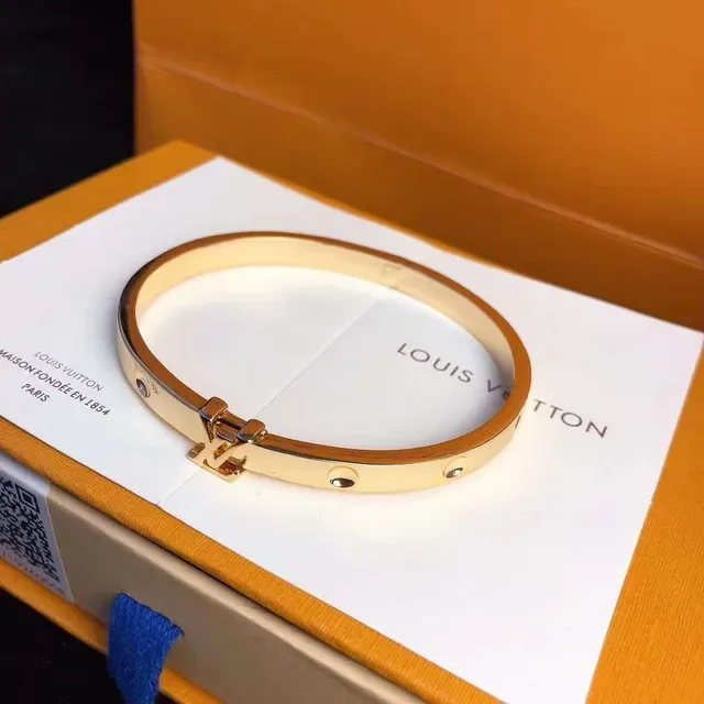 Louis Vuitton Gold-Tone Monogram Clasp Hinged Bangle Bracelet 7