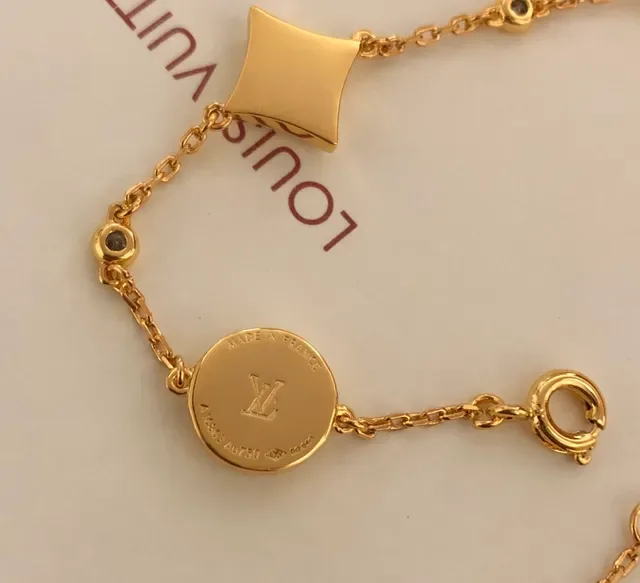 Pulsera Louis Vuitton Cadena Dorada Blanca Motivos Florales Cuadrifolio 5