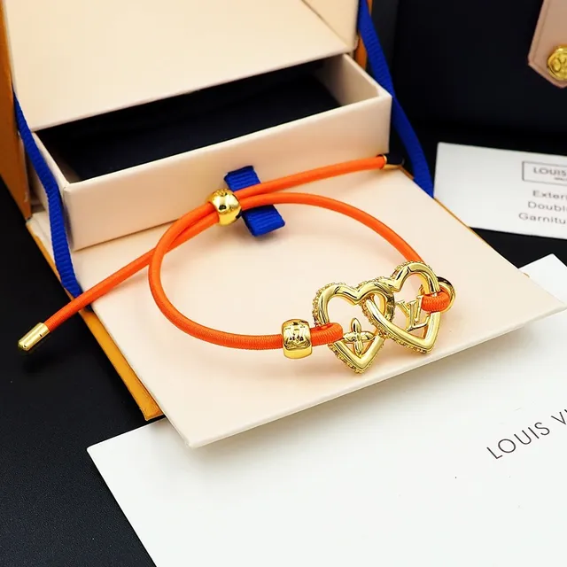 Louis Vuitton Bracelet cœur cordon orange bracelet métal ton doré 8