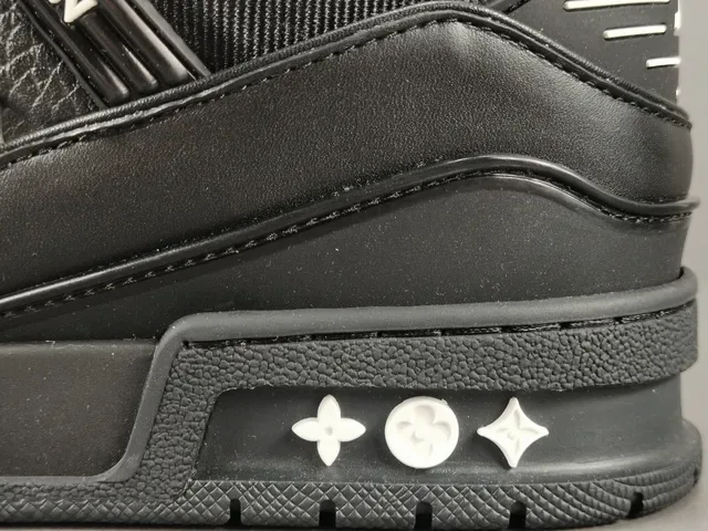Louis Vuitton LV Trainer Black White Structured Leather-Mesh Upper Asymmetrical Branded Strap Lifestyle Sneakers 7