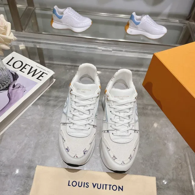 Louis Vuitton LV Trainer White Blue Leather And Mesh Upper Light Monogrammed Side Panel Chunky Sneakers 2