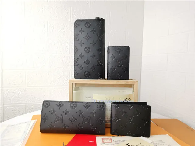 Louis Vuitton Monogram Empreinte 黑色压花 双折短钱包 2