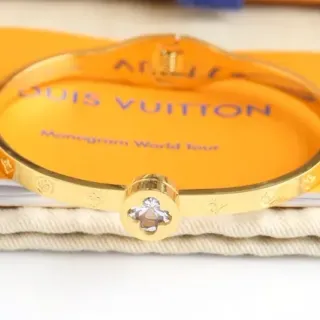 Louis Vuitton Monogram World Tour Gold-Tone Crystal Flower سوار