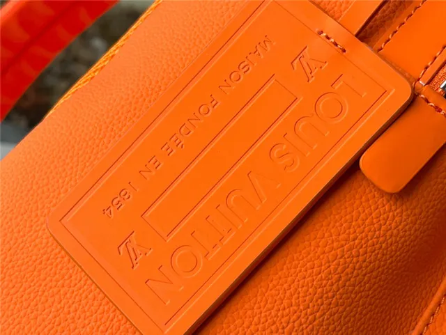 Louis Vuitton Orange Silver Structured Leather Embossed LV Monogram Casual Backpack 14
