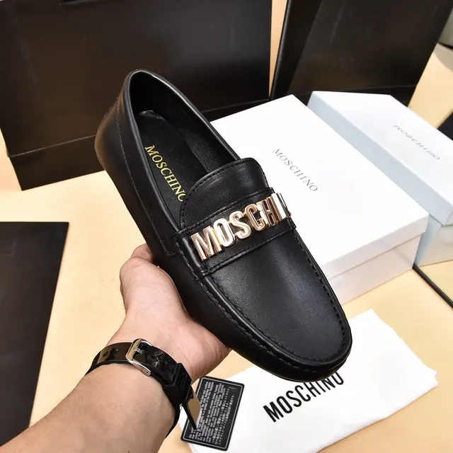 Mocassins en cuir noir avec sangle logo Moschino 7