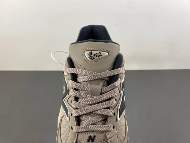 New Balance 9060 Beige Black Chunky Sneakers 6