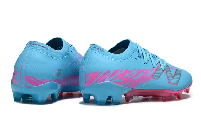 New Balance Speed Ctrl Stu azul claro rosa sapatos de futebol para terreno firme 5