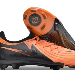 Nike Zapatillas de fútbol negro y naranja con empeine de punto y cordones asimétricos para terreno firme
